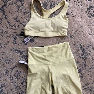 NWT Aritzia TNAction Sports bra & bike shorts lemonade